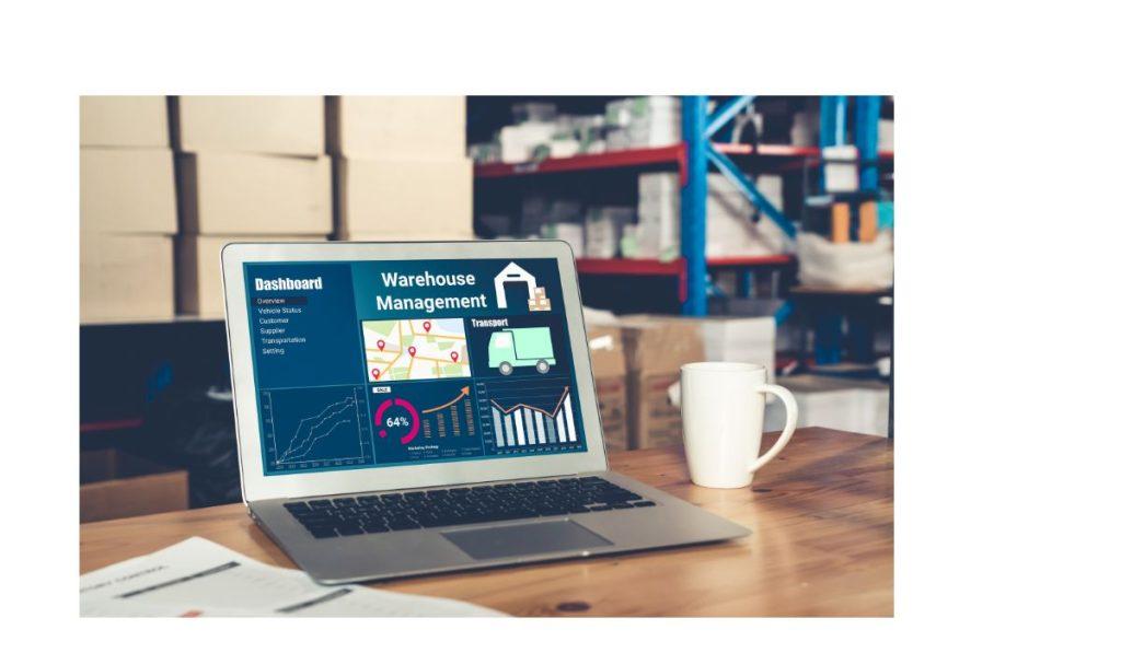 Warehouse management software computer with mug